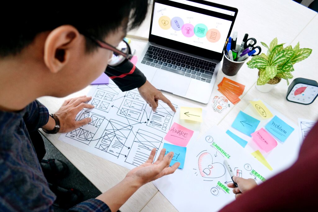 man working on an application model based on uses